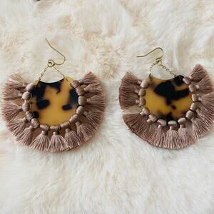 Tortoise shell fashion statement earrings with yarn fringe